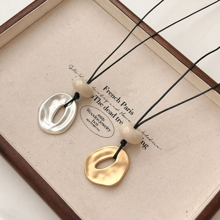 Irregular matte openwork oval pendant long necklace