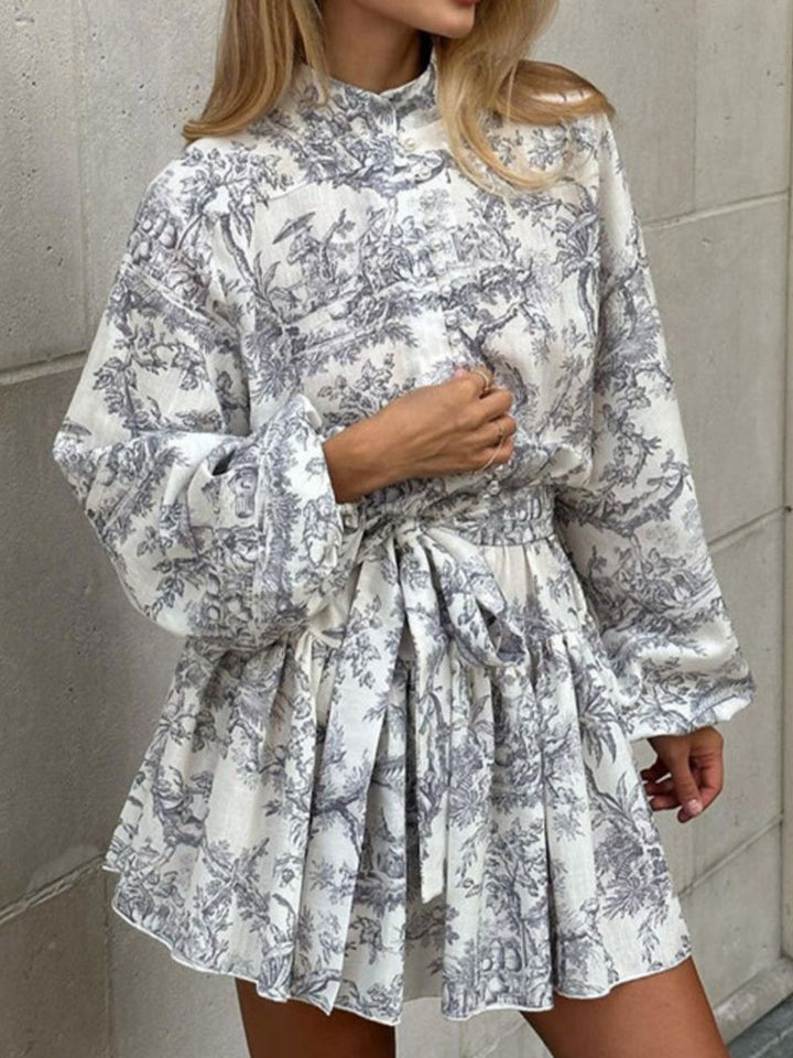 Elegant long-sleeved tie-neck printed dress