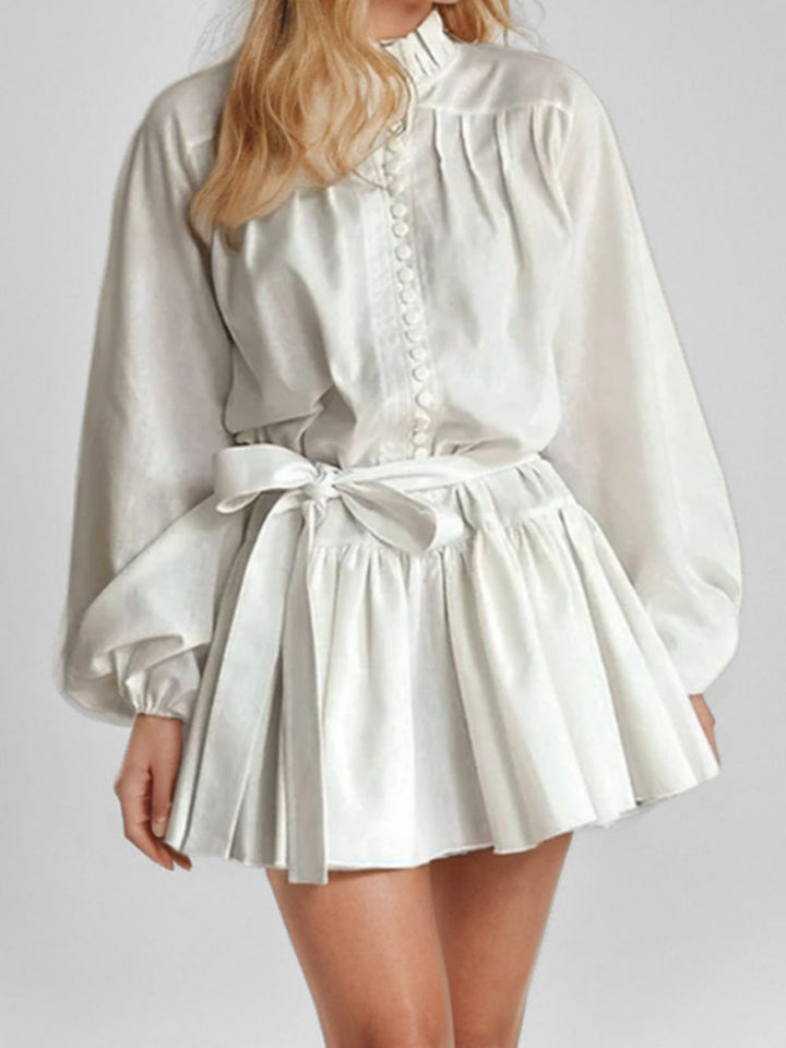 Elegant long-sleeved tie-neck printed dress