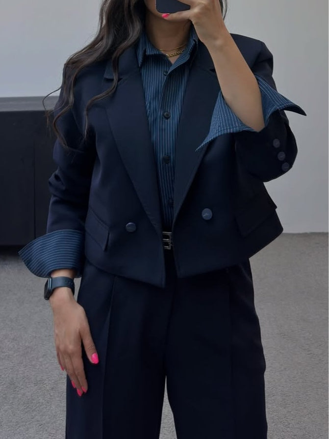 Navy blue commuter style suit with striped shirt