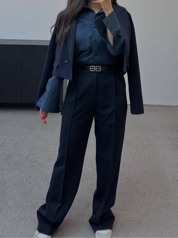 Navy blue commuter style suit with striped shirt