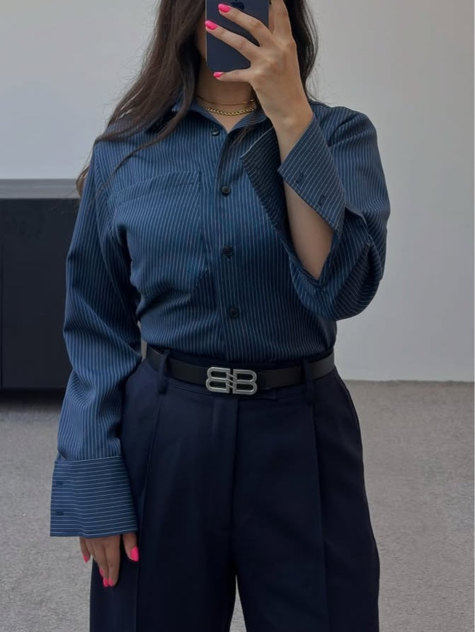 Navy blue commuter style suit with striped shirt