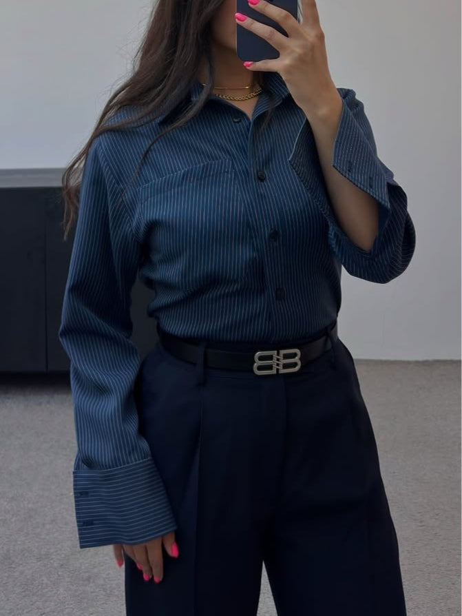 Navy blue commuter style suit with striped shirt