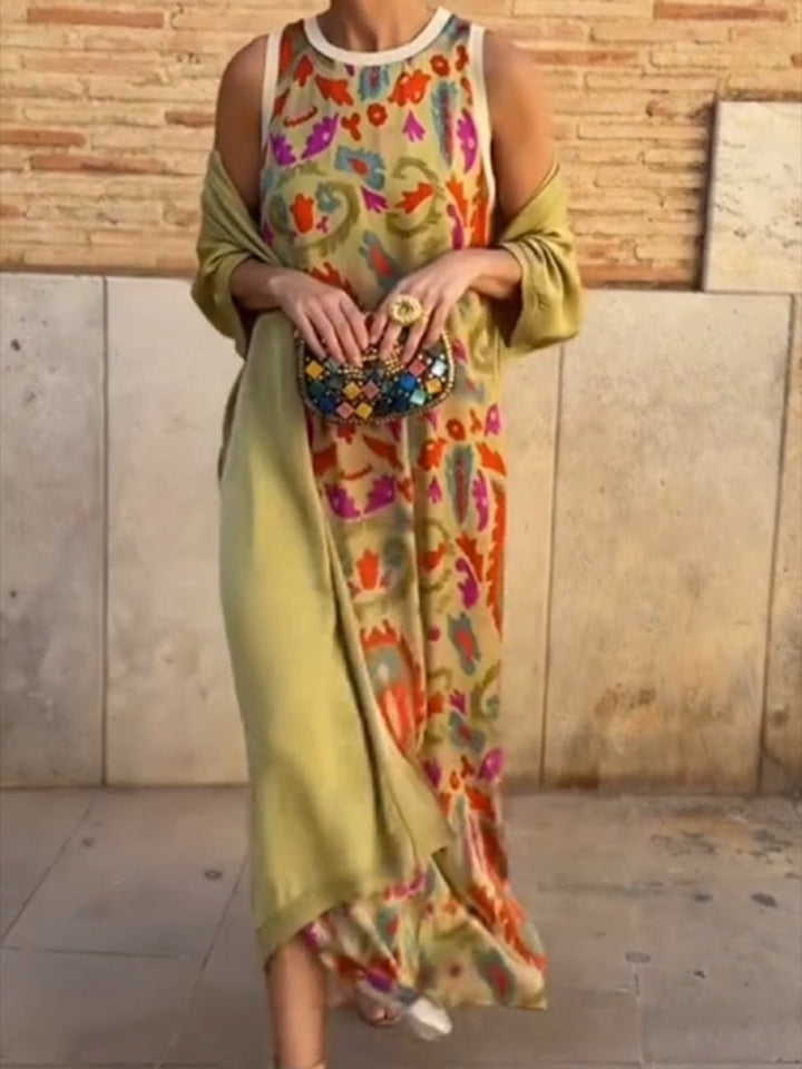 Elegant printed two-piece dress with cape